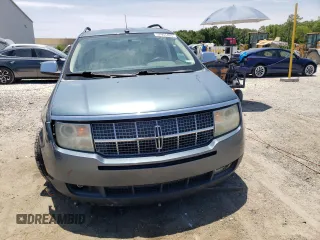 2010 Lincoln MKX z VIN 2LMDJ6JC9ABJ02617, wystawiony jako Copart lot #57953465 z przebiegiem 141 791 mil mil oraz Szkoda całkowita • Salvage title. Historia ofert i sprzedaży dostępna na DreamBid. Obrazek 5.