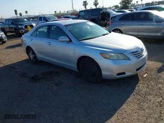 2009 Toyota Camry with VIN 4T1BE46K99U332921, listed as a IAAI auction lot 41871598 with 173,005 mi miles. Bid and sale history available at carsss.com. Image 1.