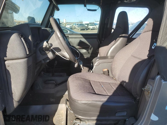 2001 Jeep Wrangler Sport with VIN 1J4FA49S21P346217, listed as a Copart auction lot 46133815 with 103,929 mi miles and Salvage Title. Bid and sale history available at carsss.com. Image 7.