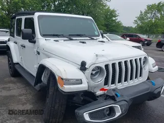 2022 Jeep Wrangler Unlimited Sahara with VIN 1C4JJXP69NW229124, listed as a IAAI auction lot 42525560 with 45,857 mi miles and . Bid and sale history available at DreamBid. Image 1.