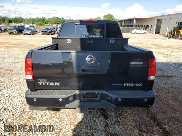 2012 Nissan Titan SV with VIN 1N6BA0EC6CN312465, listed as a Copart auction lot 58722815 with 186,207 mi miles and Salvage title. Bid and sale history available at DreamBid. Image 6.