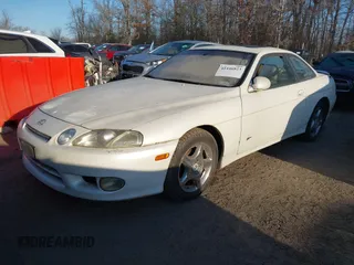 1997 Lexus SC 300 with VIN JT8CD32Z4V0040389, listed as a IAAI auction lot 41446823 with Not provided miles and . Bid and sale history available at DreamBid. Image 2.