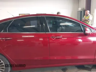 2016 Ford Fusion Titanium z VIN 3FA6P0K95GR119017, wystawiony jako IAAI lot #42148460 z przebiegiem 84 770 mil mil oraz . Historia ofert i sprzedaży dostępna na DreamBid. Obrazek 13.
