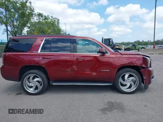 2020 GMC Yukon SLT z VIN 1GKS1BKC4LR242383, wystawiony jako IAAI lot #42104912 z przebiegiem 55 017 mil mil oraz . Historia ofert i sprzedaży dostępna na DreamBid. Obrazek 13.