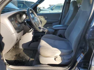 2001 Mazda Tribute LX with VIN 4F2CU08171KM43038, listed as a Copart auction lot 43267435 with 109,668 mi miles and Salvage Title. Bid and sale history available at carsss.com. Image 7.