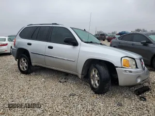 2009 GMC Envoy SLE with VIN 1GKDS33S492129469, listed as a Copart auction lot 83232024 with 131,735 mi miles and Salvage Title. Bid and sale history available at carsss.com. Image 4.
