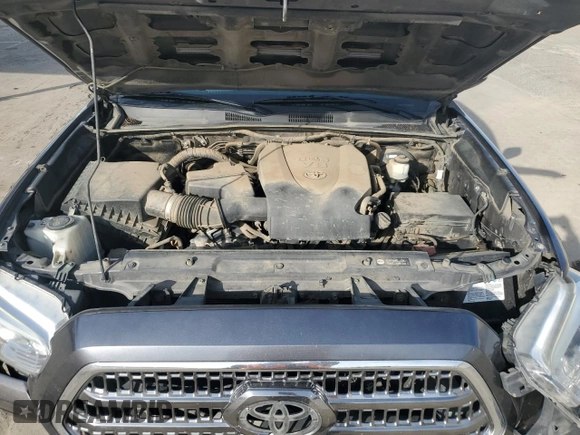 2017 Toyota Tacoma SR5 z VIN 5TFRZ5CN6HX034934, wystawiony jako Copart lot #42181755 z przebiegiem 176 511 mil mil oraz Szkoda całkowita • Salvage title. Historia ofert i sprzedaży dostępna na DreamBid. Obrazek 11.