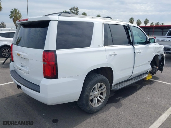2016 Chevrolet Tahoe LS with VIN 1GNSCAKC1GR139869, listed as a IAAI auction lot 41642073 with 128,380 mi miles. Bid and sale history available at carsss.com. Image 4.
