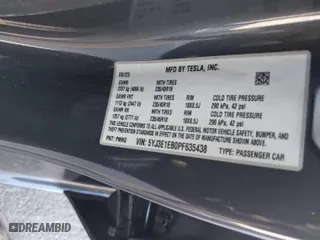 2023 Tesla Model 3 Long Range with VIN 5YJ3E1EB0PF635438, listed as a IAAI auction lot 41630945 with 48,801 mi miles. Bid and sale history available at carsss.com. Image 9.