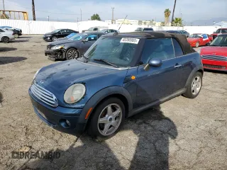2009 MINI Convertible z VIN WMWMR33589TU96481, wystawiony jako Copart lot #45398985 z przebiegiem 144 792 mil mil oraz Czysty tytuł • Clean title. Historia ofert i sprzedaży dostępna na DreamBid. Obrazek 1.