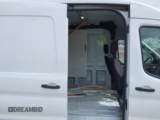 2021 Ford Transit Cargo с VIN 1FTBR2C81MKA02605, выставлен на аукционе IAAI как лот 41804703 с пробегом 94 481 миль миль и . История ставок и продаж доступна на DreamBid. Изображение 8.