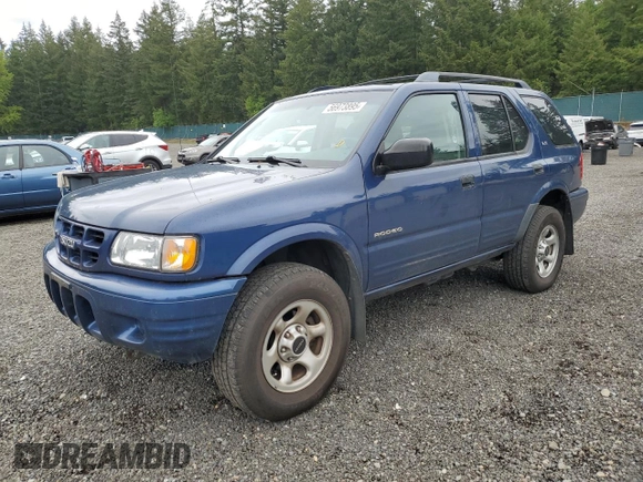 2002 Isuzu Rodeo S with VIN 4S2CK58W124301647, listed as a Copart auction lot 56973895 with 129,009 mi miles and Salvage title. Bid and sale history available at DreamBid. Image 1.