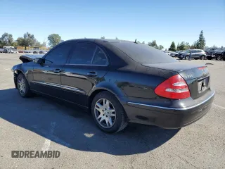 2003 Mercedes-Benz E-Class 3.2L with VIN WDBUF65J23A108105, listed as a Copart auction lot 79939884 with 238,172 mi miles and Salvage Title. Bid and sale history available at carsss.com. Image 2.