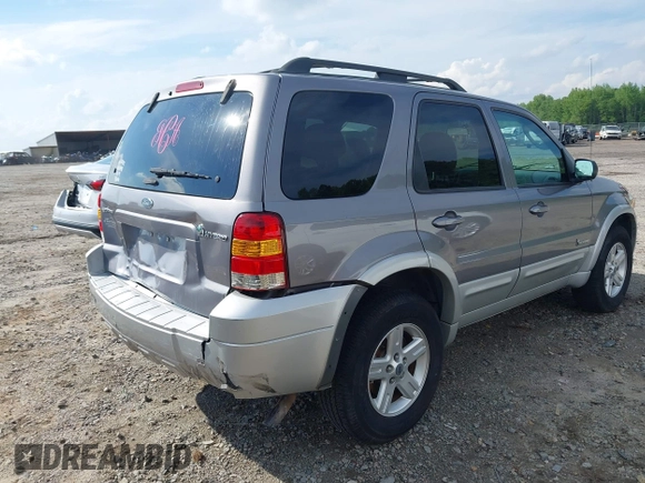 2007 Ford Escape Hybrid with VIN 1FMCU49H47KA90605, listed as a IAAI auction lot 42093591 with 136,924 mi miles and . Bid and sale history available at DreamBid. Image 4.