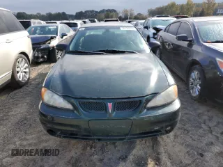 2003 Pontiac Grand Am SE with VIN 1G2NE52F03C211552, listed as a Copart auction lot 78733274 with 0 mi miles and Salvage Title. Bid and sale history available at carsss.com. Image 5.
