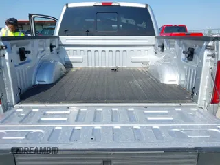 2015 Ford F-150 XLT with VIN 1FTEW1EG8FKE61864, listed as a IAAI auction lot 42120436 with 129,448 mi miles and . Bid and sale history available at DreamBid. Image 18.