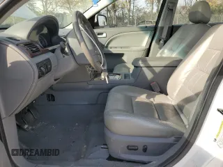 2005 Ford Five Hundred SEL with VIN 1FAFP24135G191762, listed as a Copart auction lot 77334394 with 117,630 mi miles and Salvage Title. Bid and sale history available at carsss.com. Image 7.