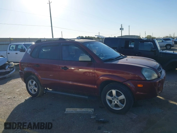 2005 Hyundai Tucson GL with VIN KM8JM12B75U108866, listed as a IAAI auction lot 41218960 with 111,319 mi miles. Bid and sale history available at carsss.com. Image 13.
