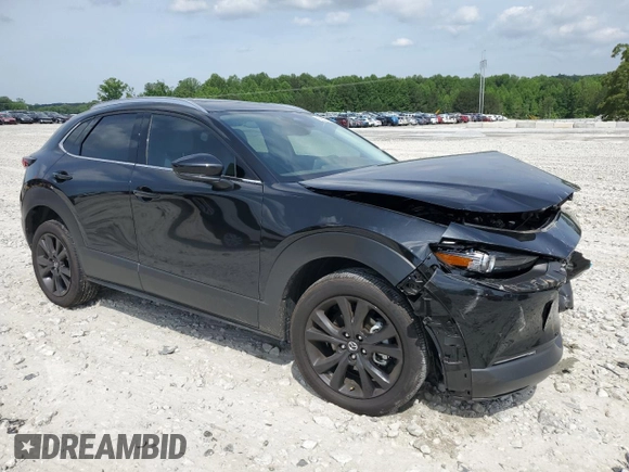 2024 Mazda CX-30 Premium Plus with VIN 3MVDMBEY9RM617907, listed as a Copart auction lot 56507565 with 8,237 mi miles and Salvage title. Bid and sale history available at DreamBid. Image 4.