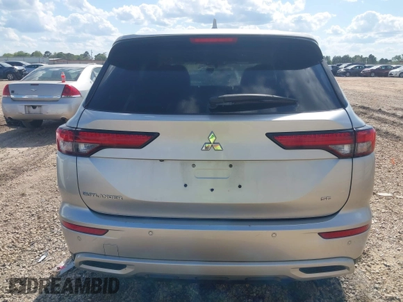 2022 Mitsubishi Outlander SE z VIN JA4J3UA82NZ021498, wystawiony jako IAAI lot #42015884 z przebiegiem 73 420 mil mil oraz . Historia ofert i sprzedaży dostępna na DreamBid. Obrazek 16.