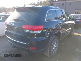 2021 Jeep Grand Cherokee Overland with VIN 1C4RJFCG3MC601150, listed as a IAAI auction lot 41421403 with 165,614 mi miles and . Bid and sale history available at DreamBid. Image 4.