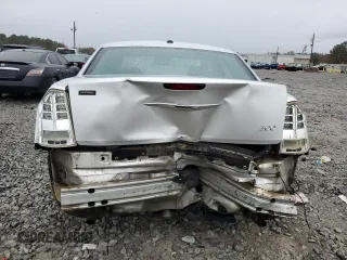 2012 Chrysler 300 Limited z VIN 2C3CCACG3CH310263, wystawiony jako Copart lot #83744764 z przebiegiem 246 532 mil mil oraz Szkoda całkowita • Salvage title. Historia ofert i sprzedaży dostępna na DreamBid. Obrazek 6.