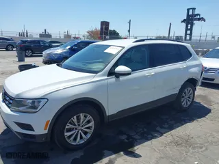 2019 Volkswagen Tiguan S with VIN 3VV1B7AX1KM101407, listed as a IAAI auction lot 42032761 with 51,868 mi miles. Bid and sale history available at carsss.com. Image 2.