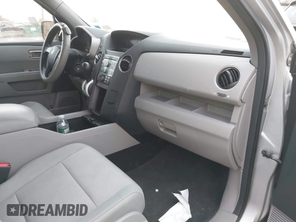 2010 Honda Pilot LX with VIN 5FNYF4H29AB002203, listed as a IAAI auction lot 40858777 with 128,621 mi miles and . Bid and sale history available at DreamBid. Image 5.