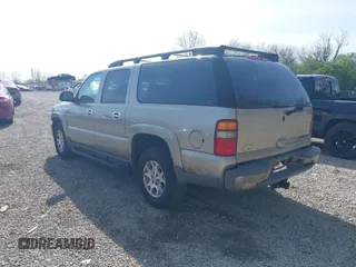 2003 Chevrolet Suburban Z71 with VIN 3GNFK16Z73G190936, listed as a IAAI auction lot 42078452 with 231,121 mi miles. Bid and sale history available at carsss.com. Image 3.
