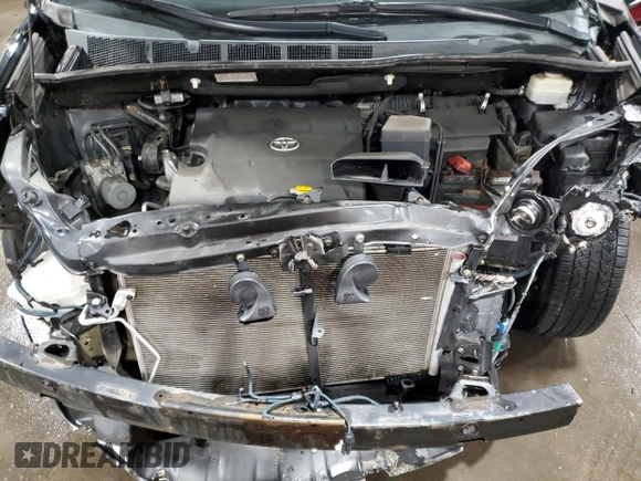 2014 Toyota Sienna LE AAS z VIN 5TDKK3DC0ES432309, wystawiony jako Copart lot #54094805 z przebiegiem 139 342 mil mil oraz Szkoda całkowita • Salvage title. Historia ofert i sprzedaży dostępna na DreamBid. Obrazek 12.