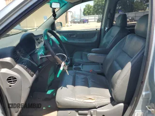 2004 Honda Odyssey EX-L with VIN 5FNRL18014B015462, listed as a Copart auction lot 62834665 with 323,817 mi miles and Salvage title. Bid and sale history available at DreamBid. Image 7.