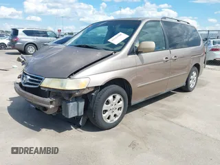 2003 Honda Odyssey EX-L z VIN 5FNRL18993B116892, wystawiony jako IAAI lot #42241908 z przebiegiem 276 223 mil mil oraz . Historia ofert i sprzedaży dostępna na DreamBid. Obrazek 20.