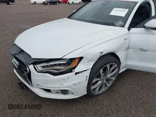2013 Audi A6 Prestige with VIN WAUHGAFC2DN153202, listed as a IAAI auction lot 42242052 with 163,295 mi miles and . Bid and sale history available at DreamBid. Image 6.