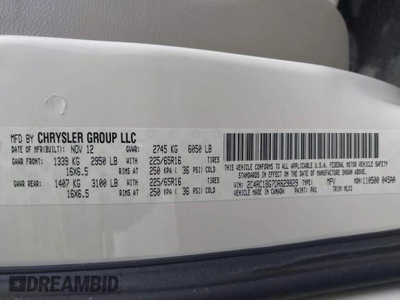 2013 Chrysler Town & Country Touring with VIN 2C4RC1BG7DR629829, listed as a IAAI auction lot 42152230 with 188,473 mi miles. Bid and sale history available at carsss.com. Image 9.