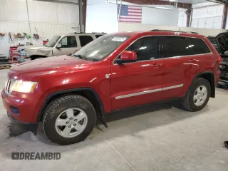 2011 Jeep Grand Cherokee Laredo z VIN 1J4RR4GGXBC575869, wystawiony jako Copart lot #56389475 z przebiegiem 131 204 mil mil oraz Szkoda całkowita • Salvage title. Historia ofert i sprzedaży dostępna na DreamBid. Obrazek 1.