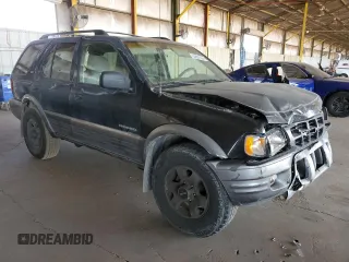 2001 Isuzu Rodeo S with VIN 4S2CK58W614344850, listed as a Copart auction lot 63807664 with 176,203 mi miles and Salvage title. Bid and sale history available at DreamBid. Image 4.