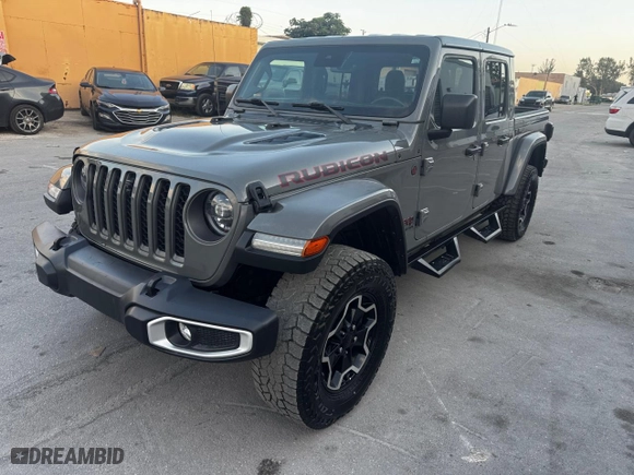 2021 Jeep Gladiator Rubicon with VIN 1C6JJTBM8ML611134, listed as a Copart auction lot 54375665 with 62,134 mi miles and Salvage Title. Bid and sale history available at carsss.com. Image 2.