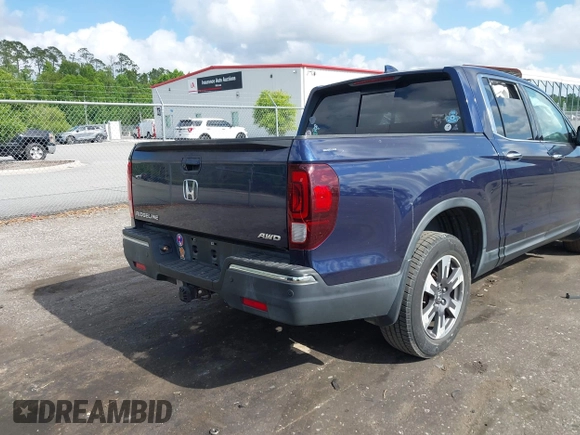 2019 Honda Ridgeline RTL-E with VIN 5FPYK3F76KB010613, listed as a IAAI auction lot 42079810 with 90,492 mi miles and . Bid and sale history available at DreamBid. Image 4.