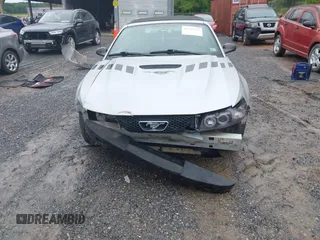 2002 Ford Mustang Deluxe z VIN 1FAFP44492F221578, wystawiony jako IAAI lot #42242232 z przebiegiem 107 773 mil mil oraz . Historia ofert i sprzedaży dostępna na DreamBid. Obrazek 13.
