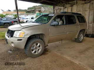 2004 GMC Envoy SLT with VIN 1GKET16S646134112, listed as a Copart auction lot 59743314 with Not Provided miles and Salvage Title. Bid and sale history available at DreamBid. Image 1.
