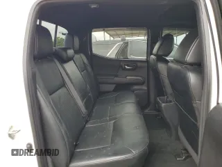 2018 Toyota Tacoma SR z VIN 3TMCZ5AN5JM181489, wystawiony jako Copart lot #55696365 z przebiegiem 70 091 mil mil oraz Szkoda całkowita • Salvage title. Historia ofert i sprzedaży dostępna na DreamBid. Obrazek 10.