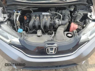 2015 Honda Fit EX-L z VIN 3HGGK5H83FM757658, wystawiony jako Copart lot #59907425 z przebiegiem 139 053 mil mil oraz Szkoda całkowita • Salvage title. Historia ofert i sprzedaży dostępna na DreamBid. Obrazek 11.