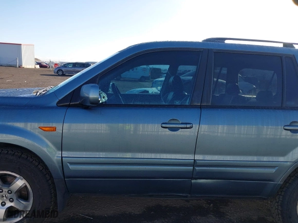 2006 Honda Pilot EX-L with RES with VIN 2HKYF18666H511059, listed as a IAAI auction lot 41719613 with 143,084 mi miles. Bid and sale history available at carsss.com. Image 14.