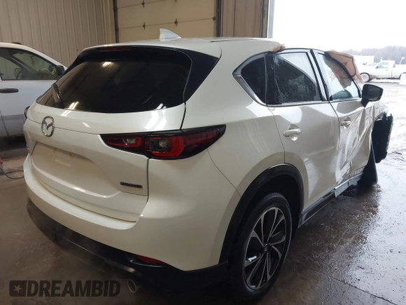 2023 Mazda CX-5 2.5 S Premium Plus Package with VIN JM3KFBEM5P0258952, listed as a IAAI auction lot 41509174 with 24,712 mi miles. Bid and sale history available at carsss.com. Image 4.