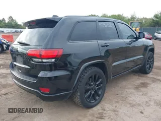 2018 Jeep Grand Cherokee Altitude with VIN 1C4RJFAG0JC420683, listed as a IAAI auction lot 42365727 with 148,730 mi miles and . Bid and sale history available at DreamBid. Image 4.