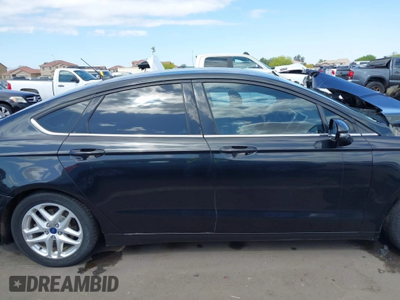 2014 Ford Fusion SE with VIN 3FA6P0H76ER356943, listed as a IAAI auction lot 42057895 with 161,213 mi miles and . Bid and sale history available at DreamBid. Image 13.