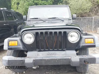 2004 Jeep Wrangler SE with VIN 1J4FA291X4P800973, listed as a IAAI auction lot 42691809 with 116,942 mi miles and . Bid and sale history available at DreamBid. Image 6.