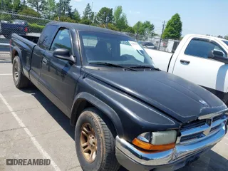 2004 Dodge Dakota SLT with VIN 1D7GL42N14S527342, listed as a IAAI auction lot 42081956 with 165,157 mi miles. Bid and sale history available at carsss.com. Image 1.
