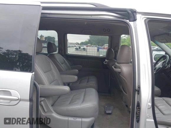 2004 Honda Odyssey EX-L with VIN 5FNRL18934B076486, listed as a IAAI auction lot 42315160 with 209,467 mi miles and . Bid and sale history available at DreamBid. Image 8.