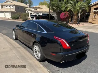 2012 Jaguar XJ with VIN SAJWA2GBXCLV24464, listed as a Copart auction lot 52572955 with 135,087 mi miles and Clean Title. Bid and sale history available at carsss.com. Image 3.